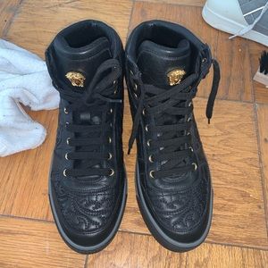 black and gold Versace shoes